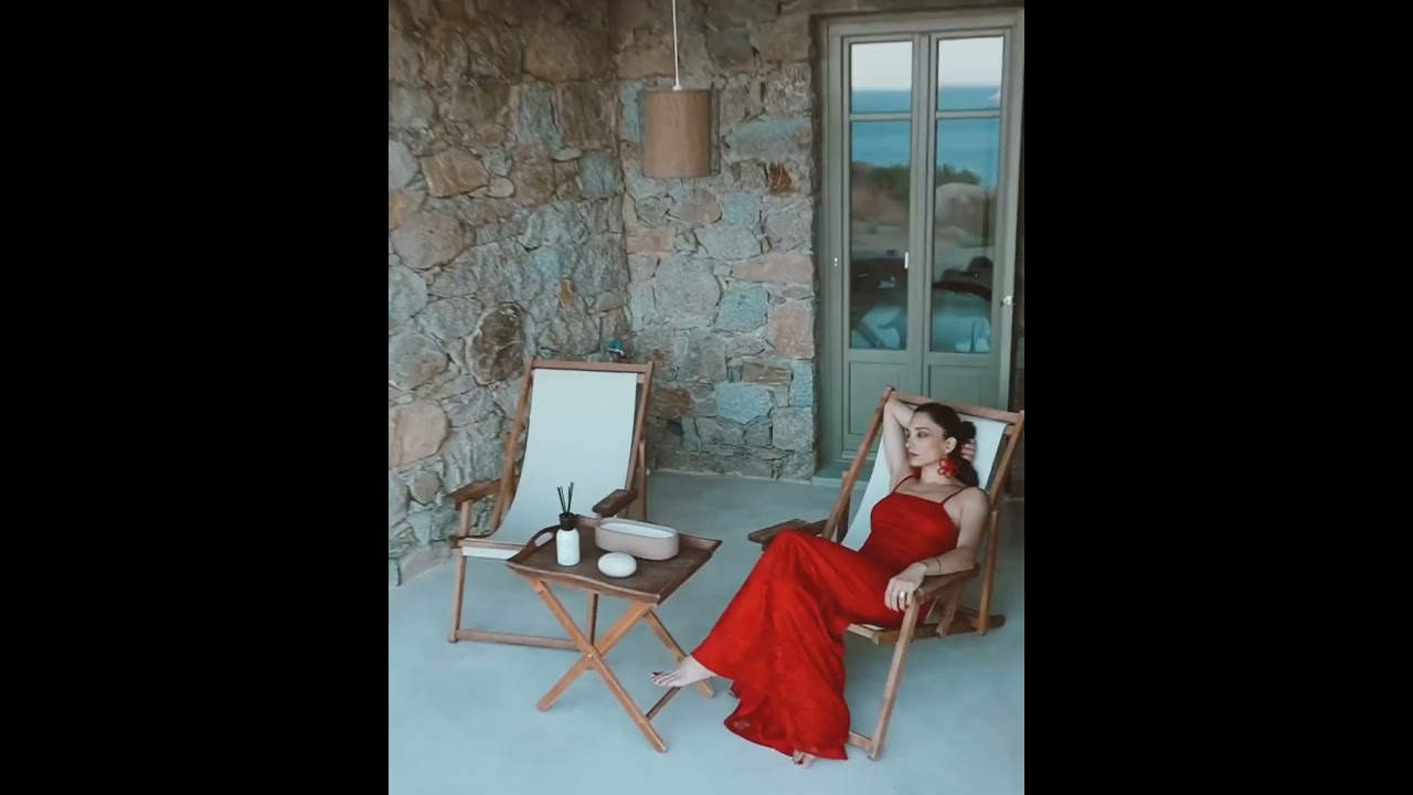 Greek model relaxing barefeet