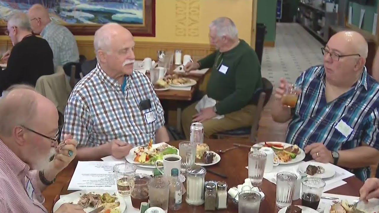 Group of gay men in their prime celebrate pride through community