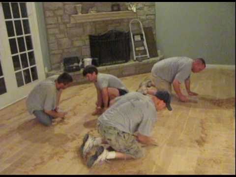 hand distressing hardwood floor.avi