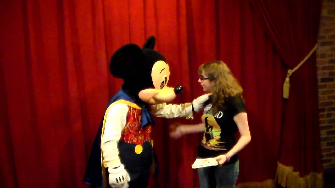 Hannah meeting Magician Mickey on 2014-2015 Trip