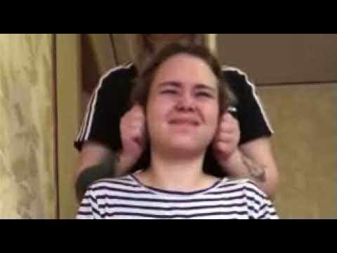 Hard ear pulling and twisting