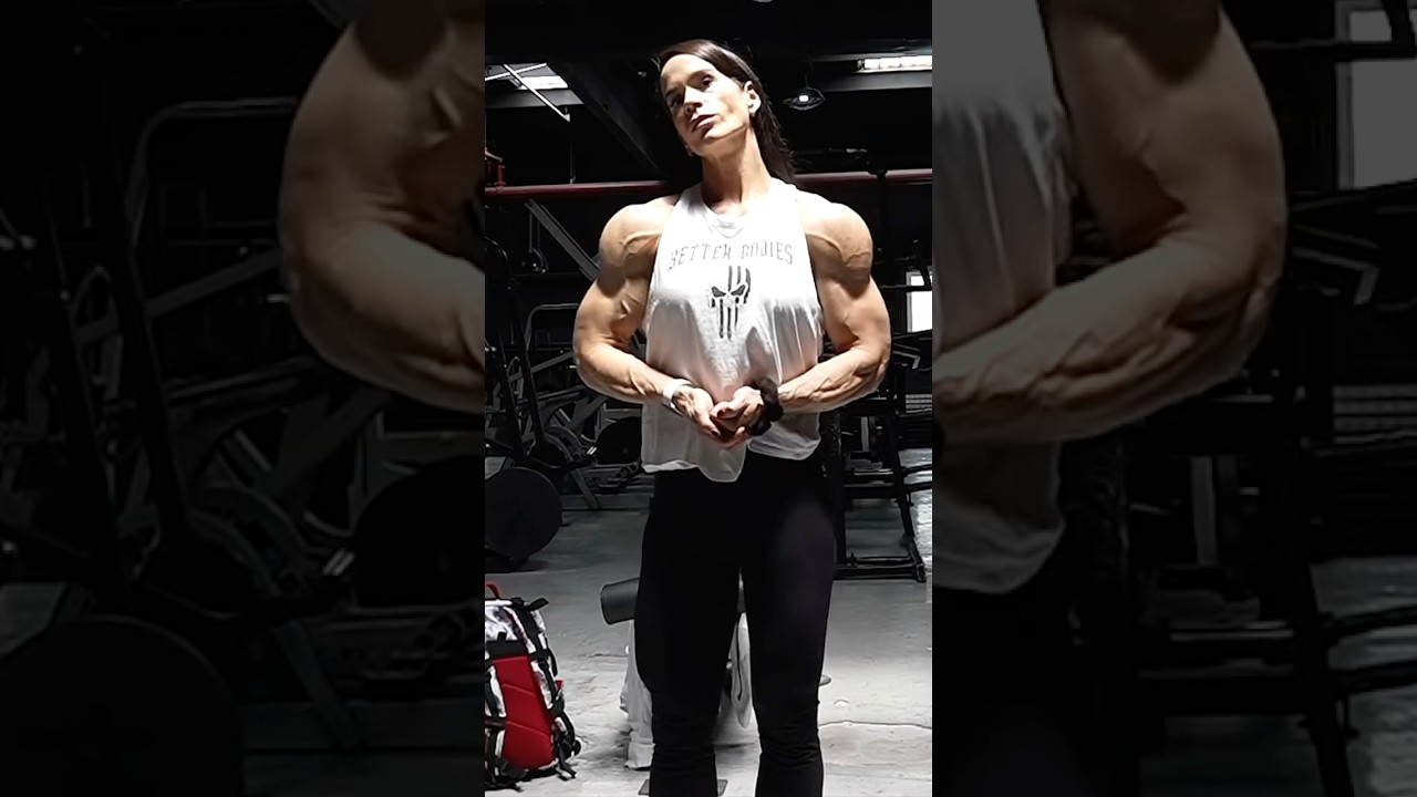 Her HUGE Arms and Shoulders Flex - Rebecca Farrell