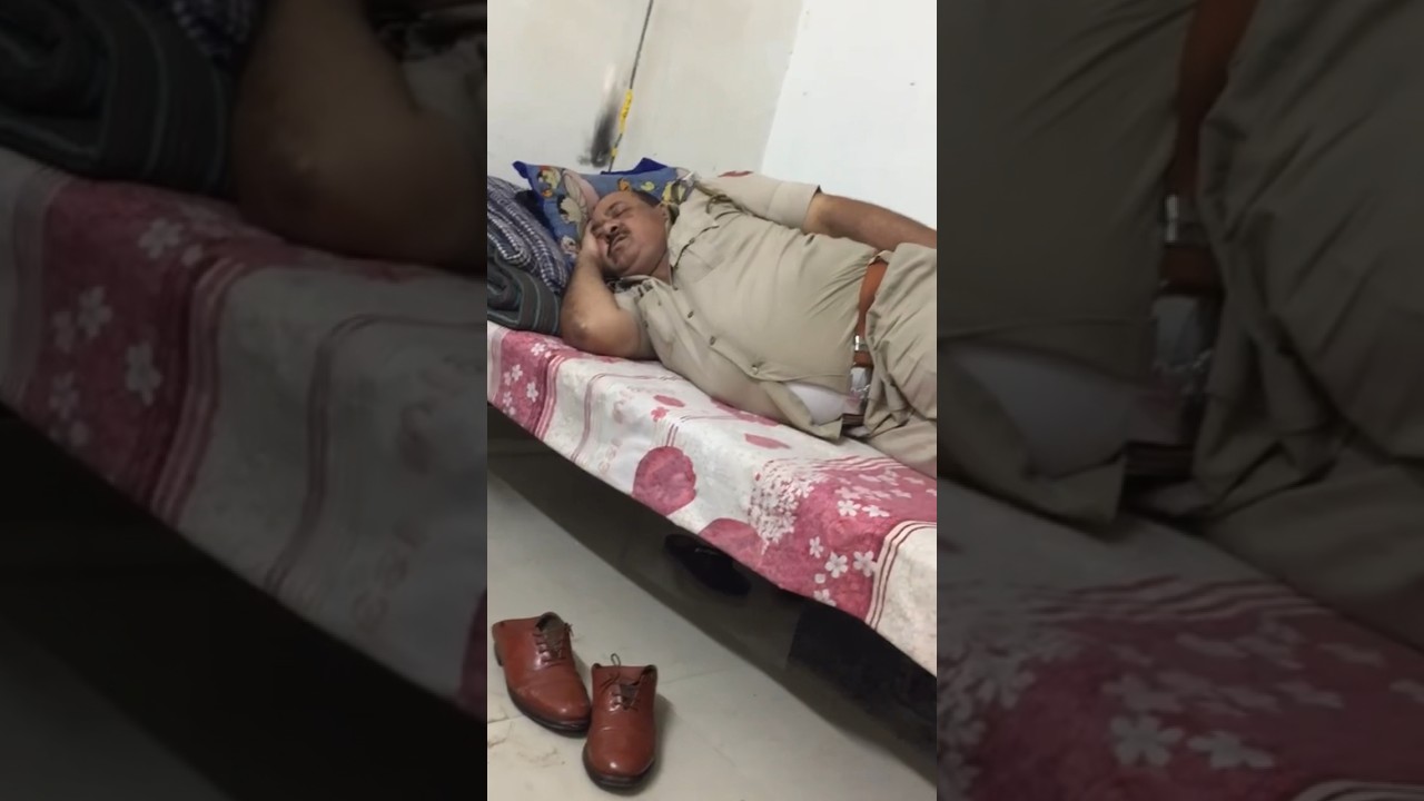 Hidden Camera Catches Indian Police Officer Sleeping