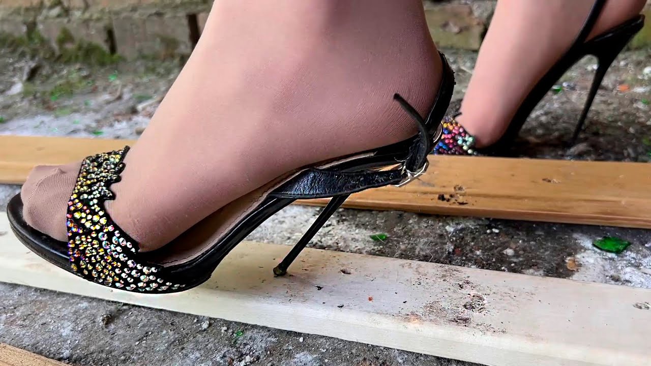 High heels bending, one heel standing, high heels crush, sinking heels into wooden planks (# 1065)