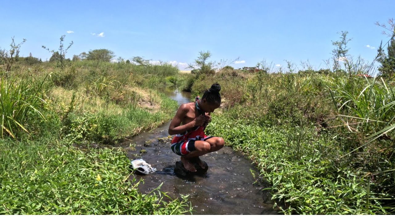 How Africa village girl bath in the river