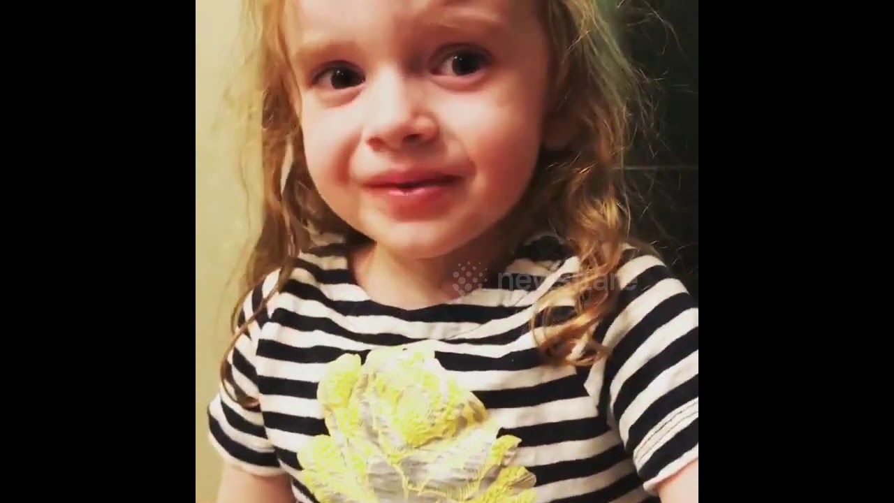 'I'm OK!' Four-year-old US girl tries extremely hard to enjoy her mum's cooking