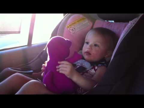 Isabelle just got her 1st Barney doll! 6/7/12