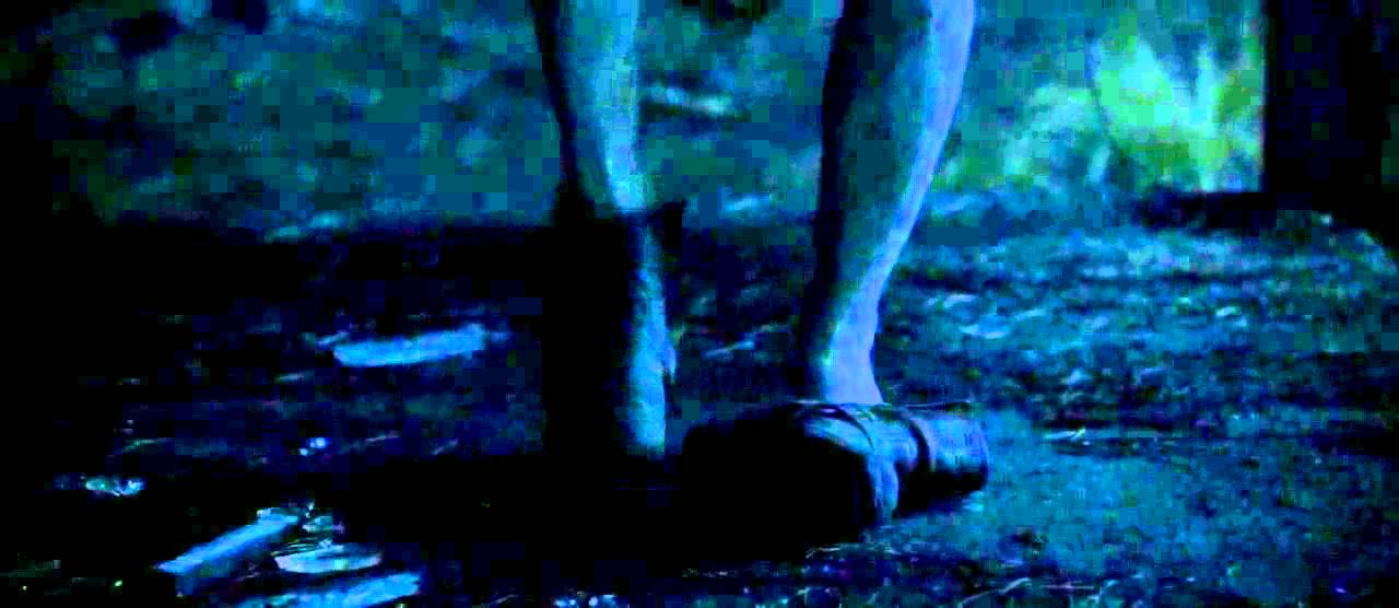 Jane Levy, barefoot putting boot on (slow-mo)