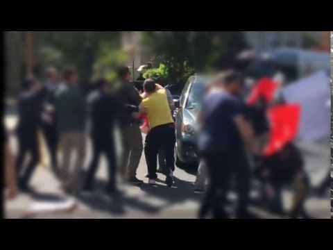 Kenan Dereci initiating attack on a protester