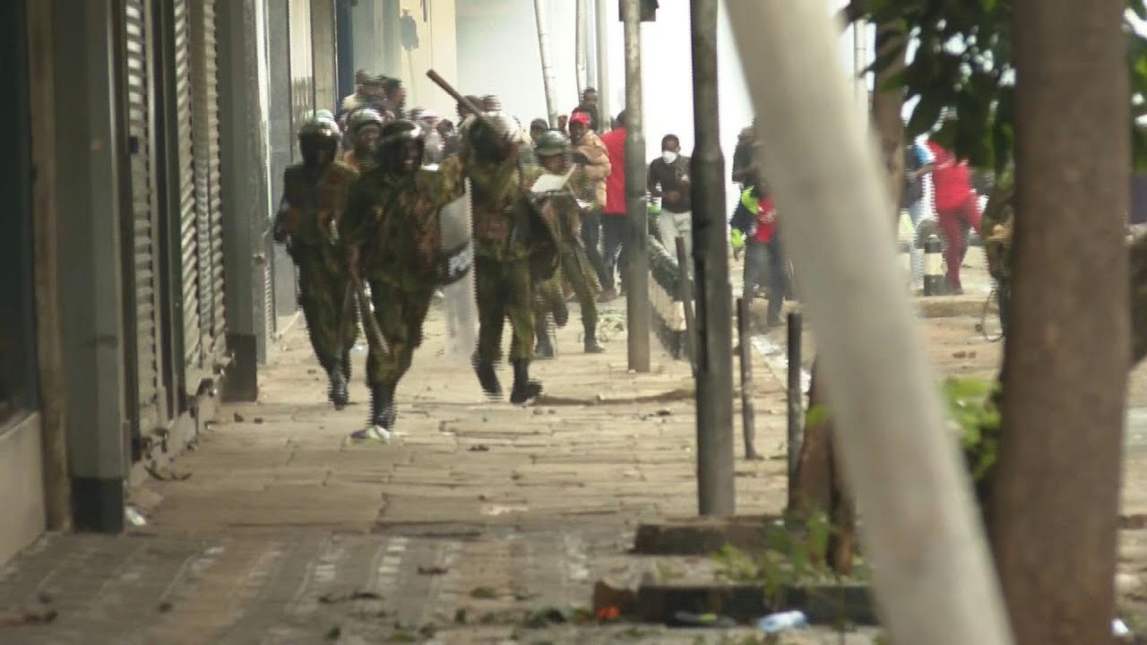Kenyan protesters charge police as demonstrations turn violent | AFP