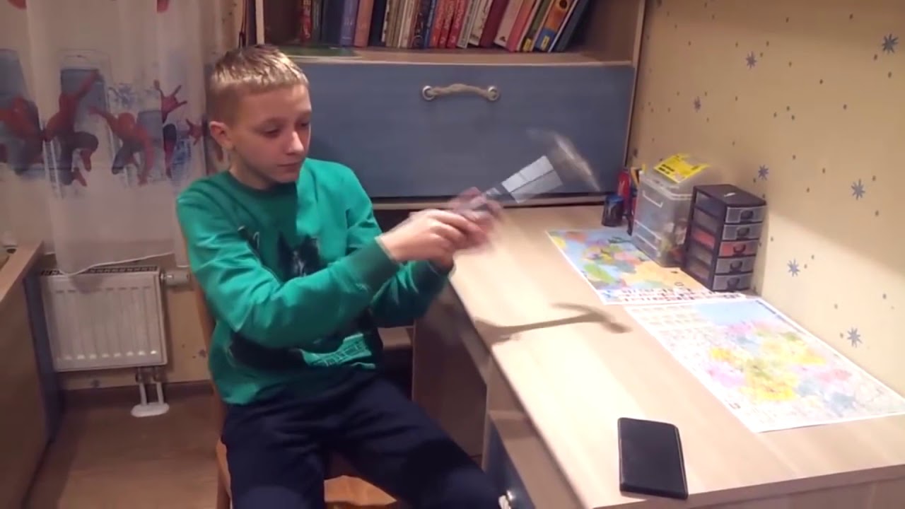 Kid breaks Phone with hammer (lol xd)
