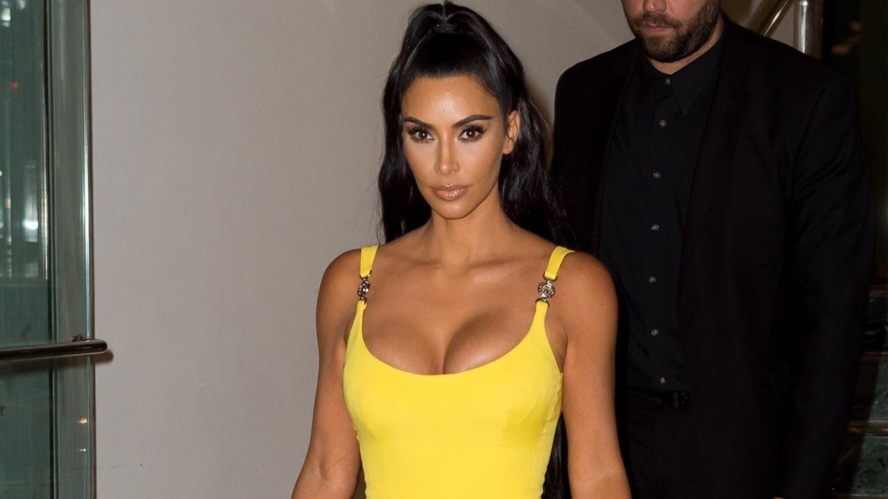 Kim Kardashian Rocks Cleavage-Baring Versace Dress For Dinner in Miami