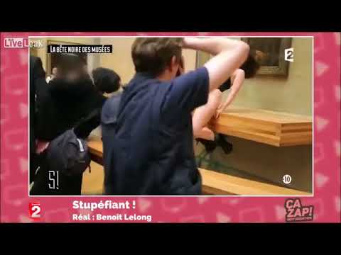 Liberal artist shows her private parts in front of Mona Lisa painting