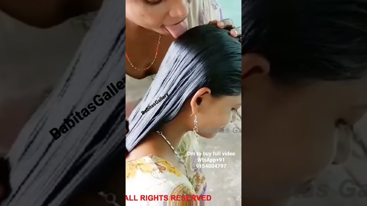 licking oilyhair #shorts #youtubeshorts #viral #ytshorts #longhair #babita #trend #oil #hair #sleek