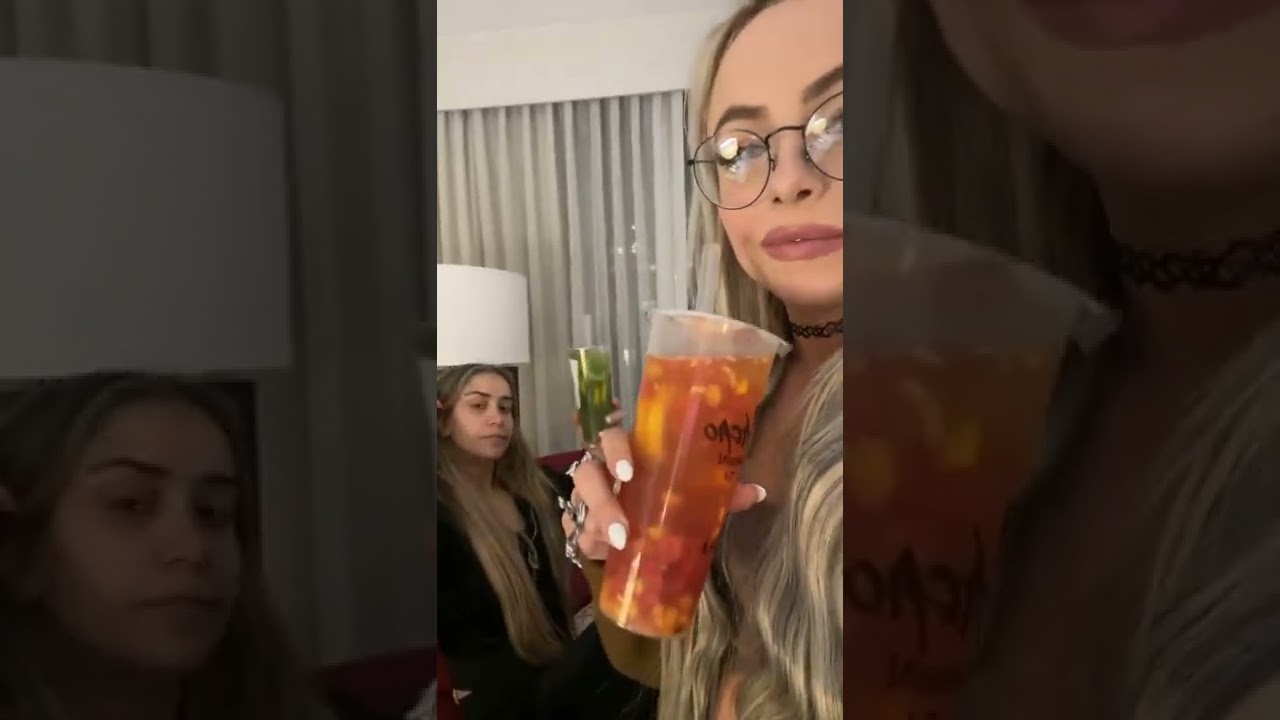 Liv Morgan has a drink  and her friend shakes her butt 9/28/2022
