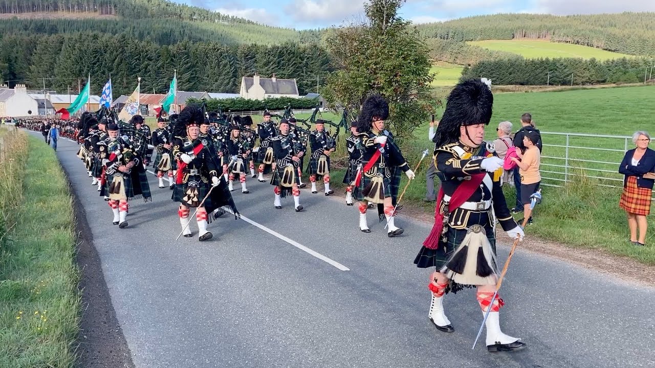Lonach Highlanders marching through Strathdon in Scotland during 2022 Lonach Gathering in Scotland