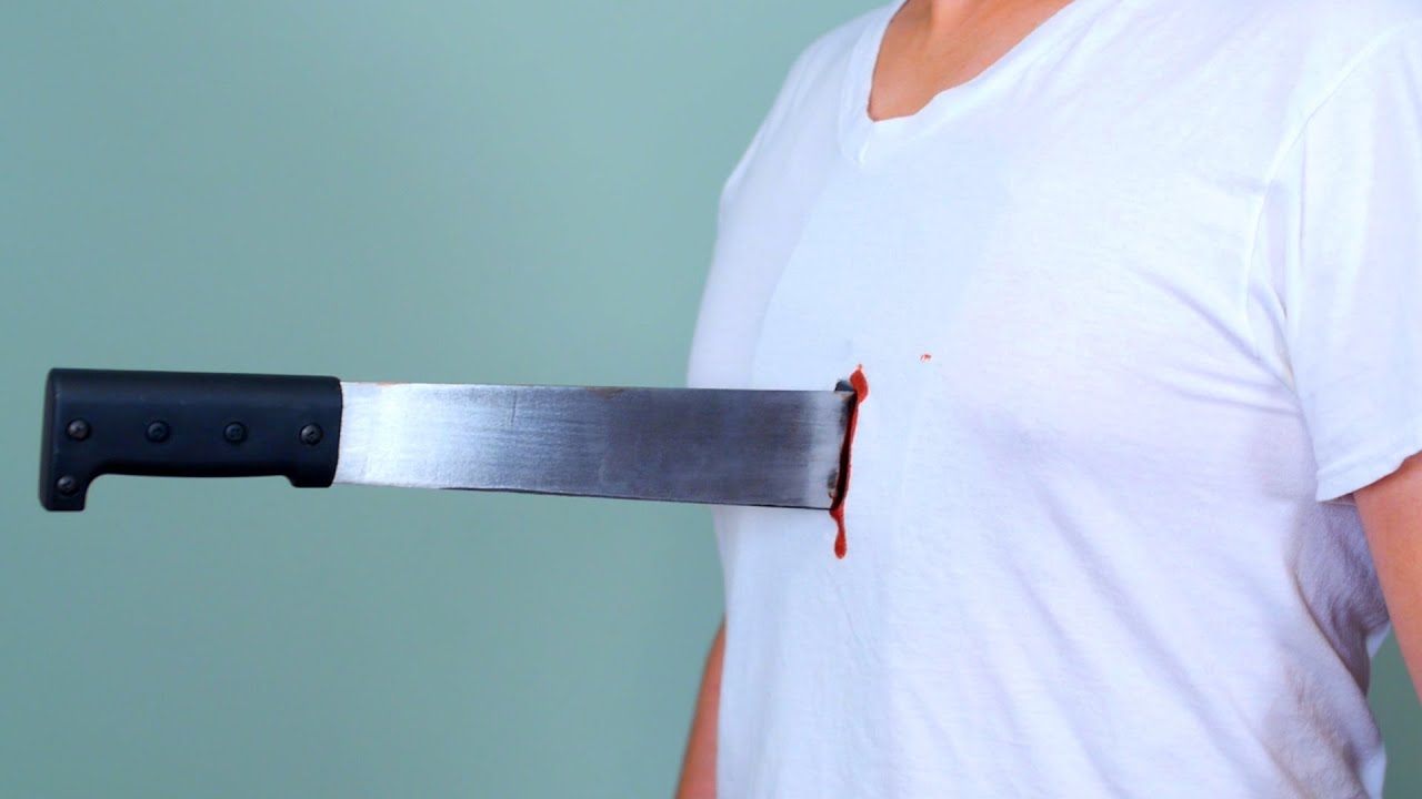 MACHETE THROUGH CHEST!