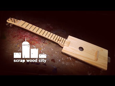 Making a 4 string acoustic guitar out of scrap wood and metal