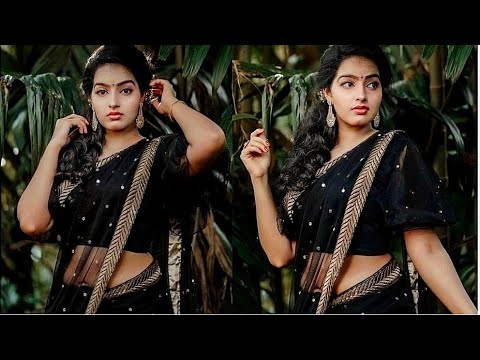 Malayalam actress Malavika Menon hot navel seen in Black transparent saree 🔥🔥🔥
