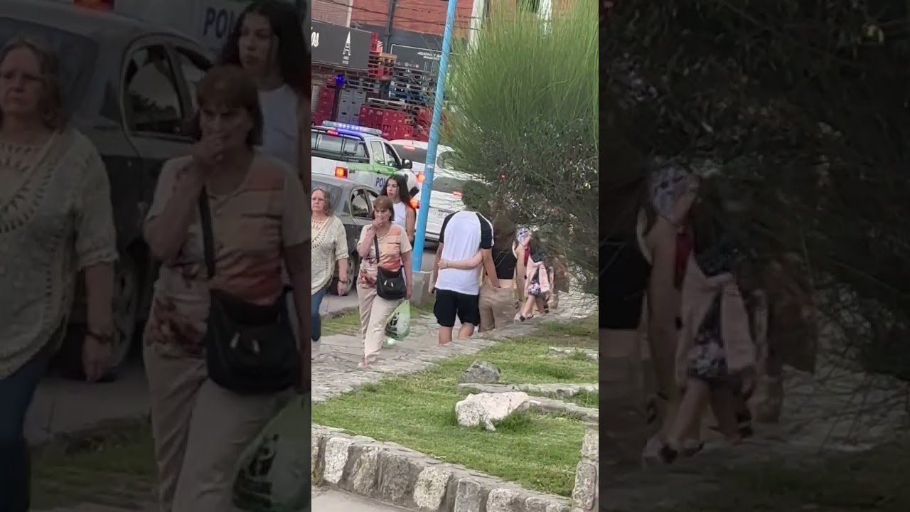 Man’s hand in woman’s pants as they walk together in Tafí del Valle, Argentina