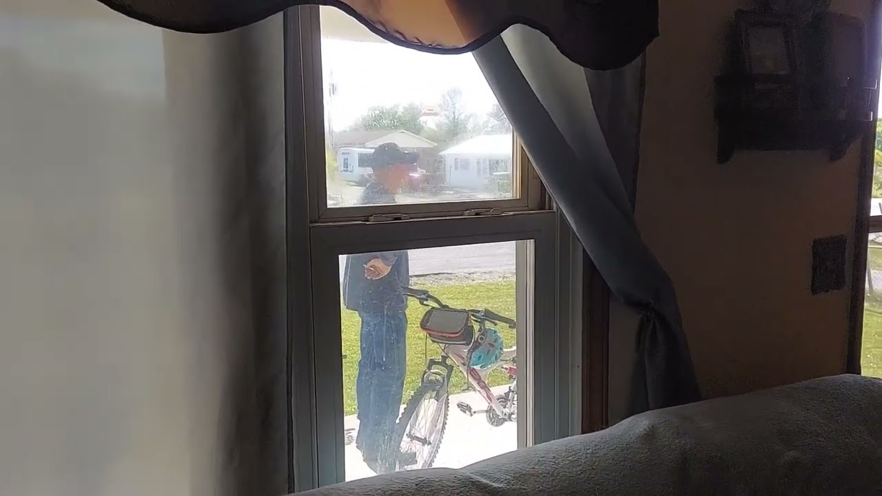 mature wife talking to neighbor braless