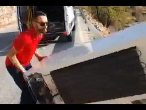 Men forced to haul fridge back up cliff| CCTV English