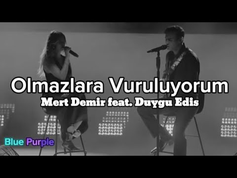 Mert Demir feat. Duygu Edis - Olmazlara Vuruluyorum Lyrics müzik video şarkı sözleri