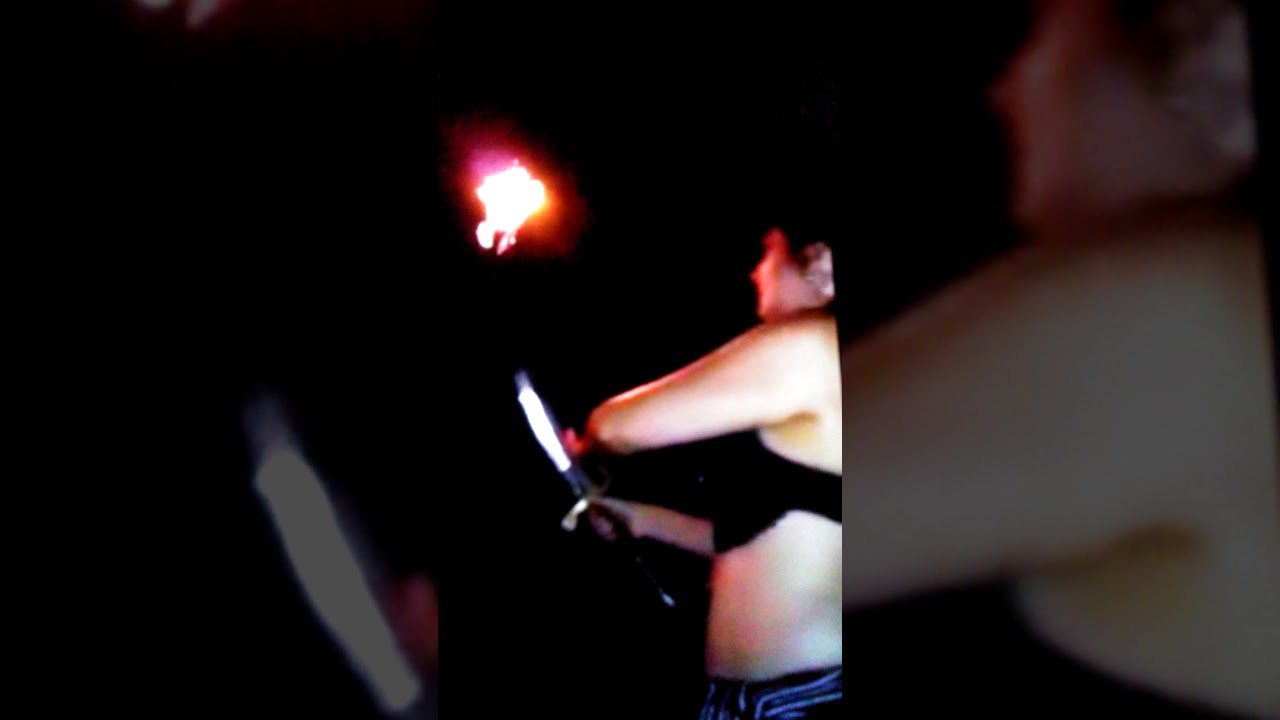 Miriam belly dance with fire.