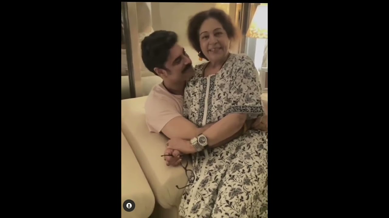 Mother & Son cute moments.  Mother sitting on son's lap. #KirronKher&SikandarKher