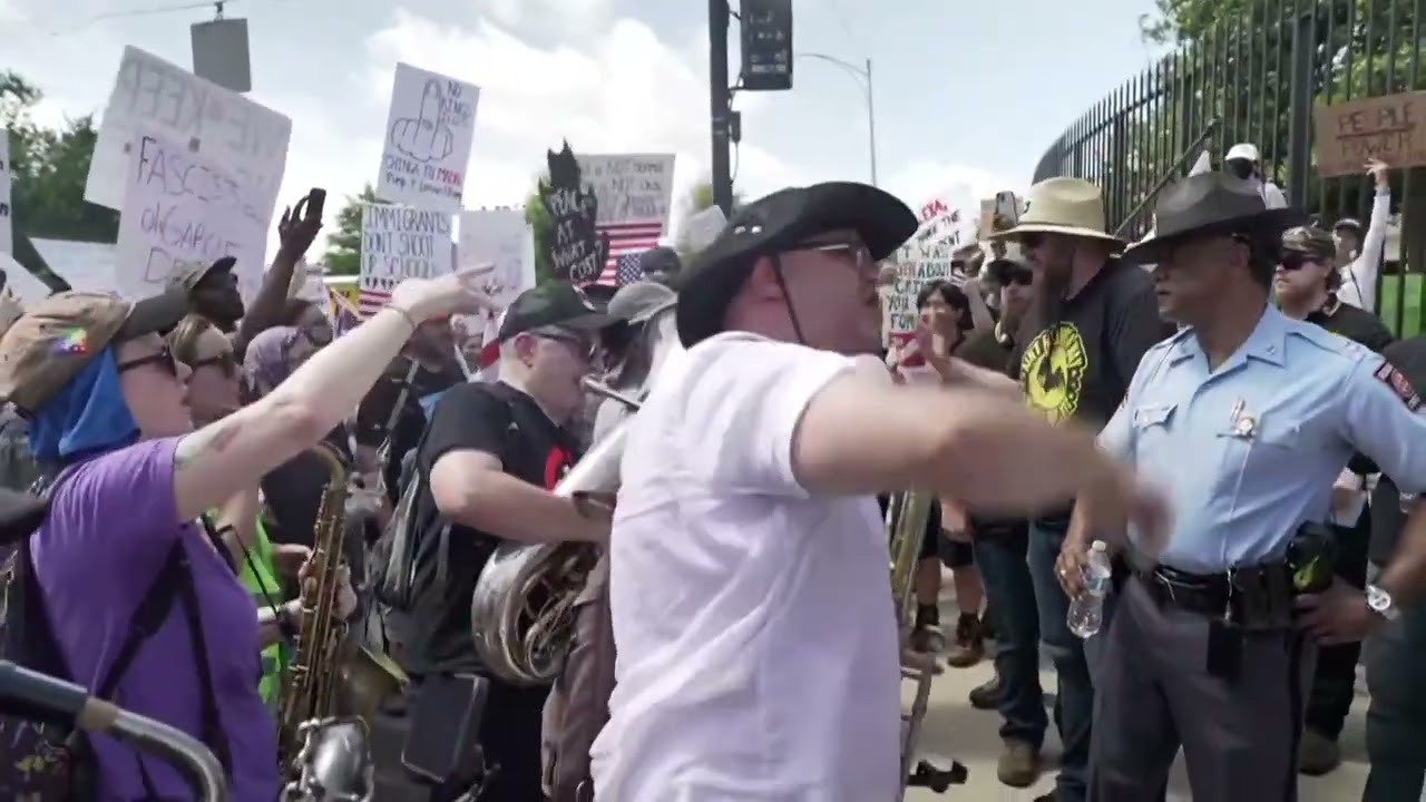 Musicians surround Proud Boys, drown them out with tubas at 'No Kings' protest in Atlanta