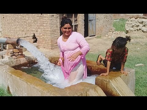 My out door bathing routine _ village tube well _ Desi house wife life _ Desi aunty daily vlog