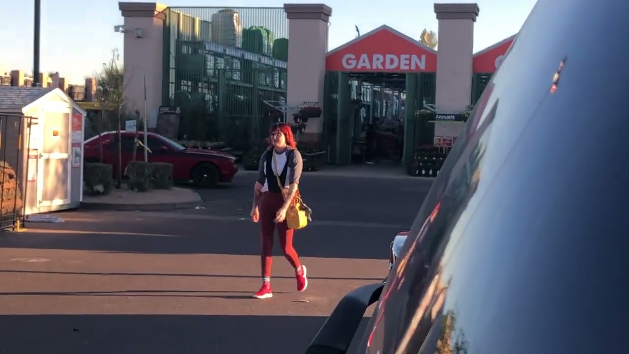 Nerdy girl caught in Shoulder Wedgie at Home Depot