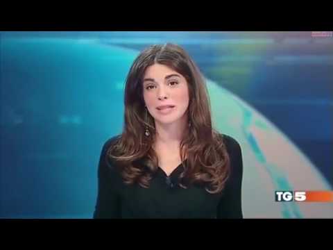 News presenter forgets she's sitting at a glass desk and gives viewers an eyeful on live TV