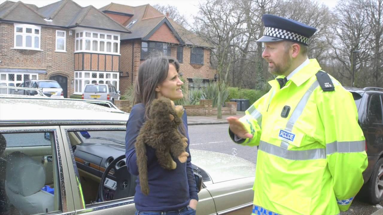 Nina Conti and Monkey being stopped by a policeman (Dan Lees)