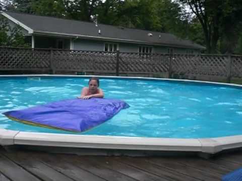 niner and butts diving in the pool