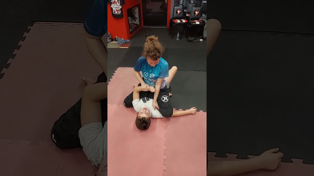 Penelope going for the tickle submission