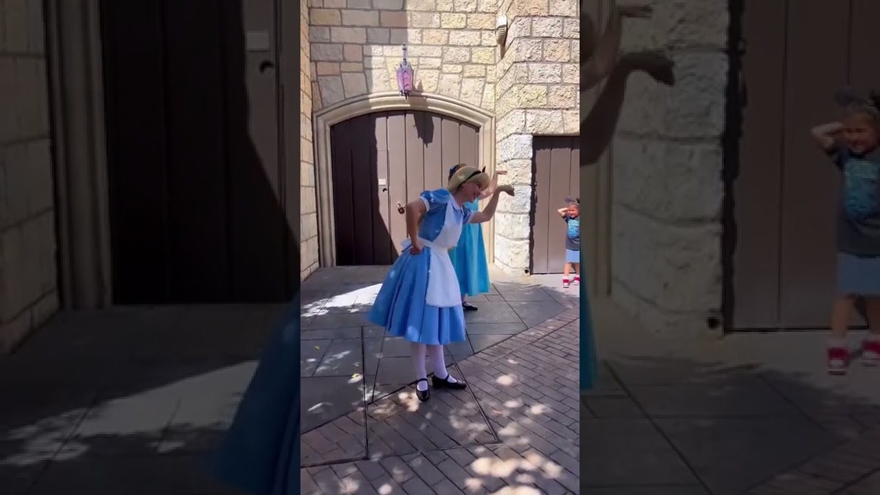 Peter Pan, Wendy Darling and Alice play Simon Says at Disneyland