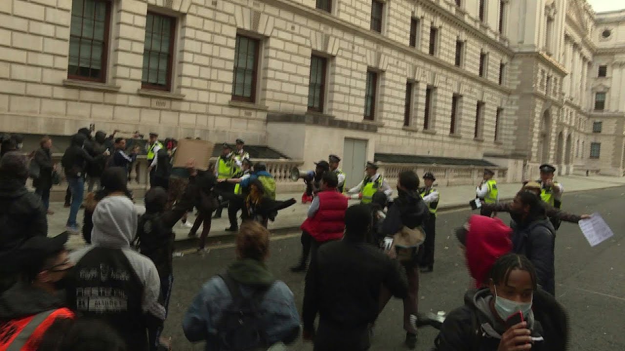Police and protesters clash during George Floyd demonstration in London | AFP