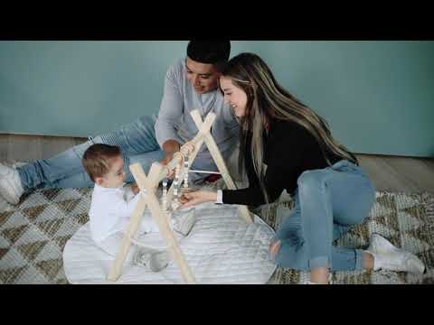 Poppyseed Play - Wooden Baby Gym with Gray Toys and White Round Mat