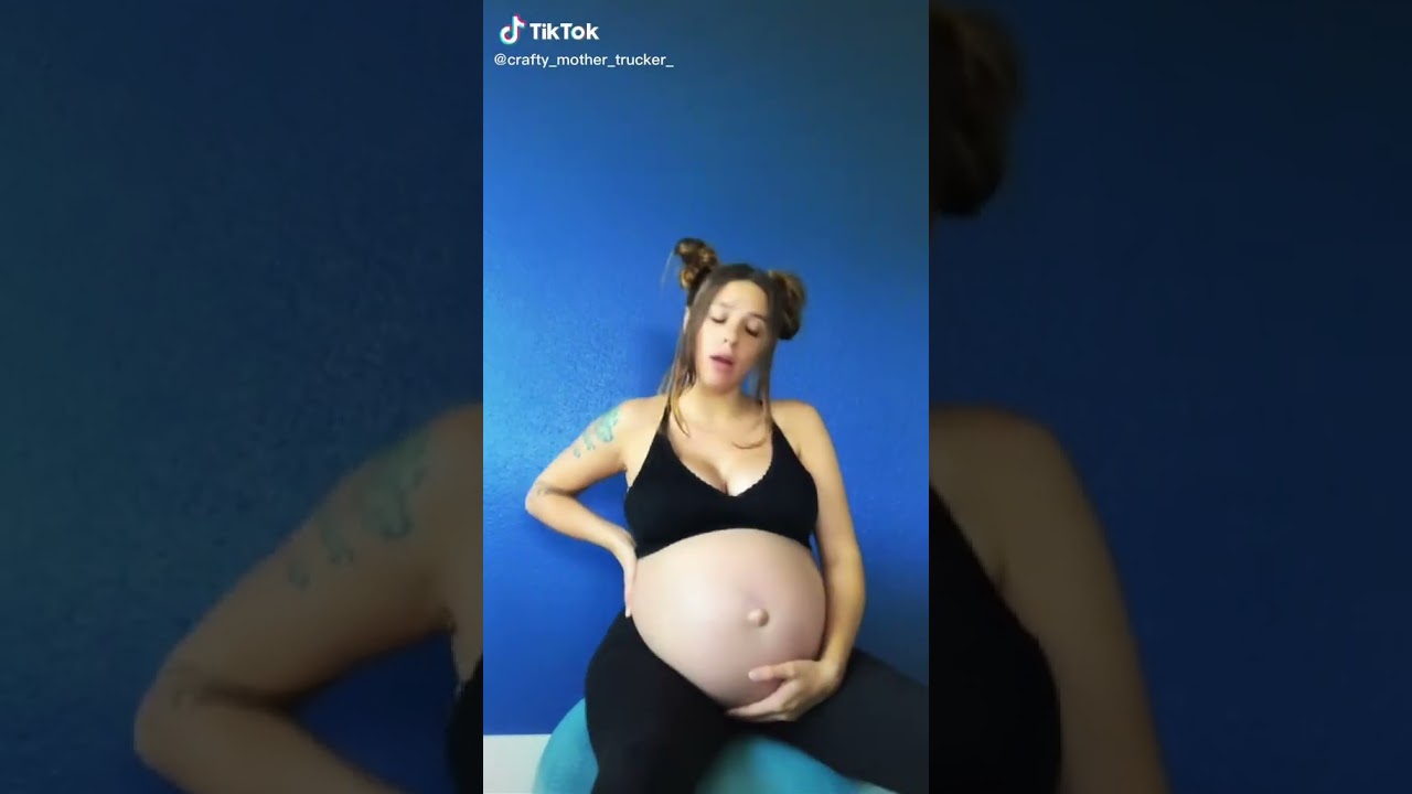 Preggo bouncing on exercise ball