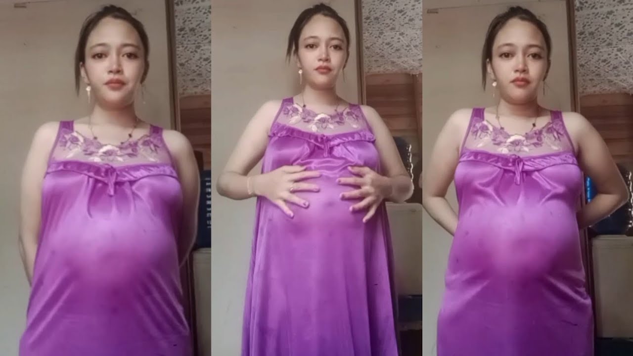 pregnant woman in evening uniform