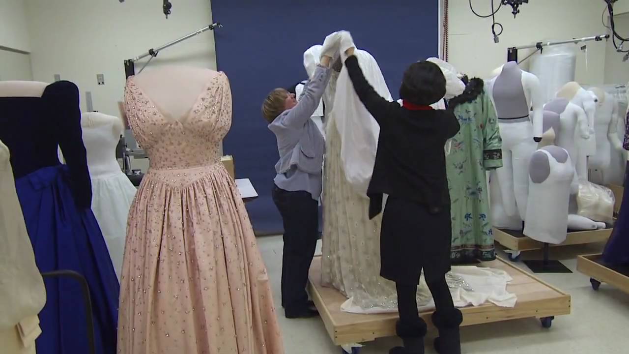 Preparing the gowns for the First Ladies Exhibition (Michelle Obama inaugural gown donation)