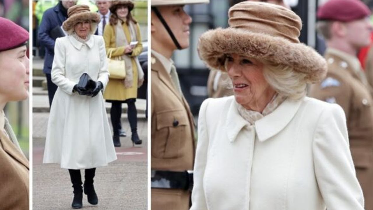 Queen Camilla is in Colchester wearing a Fiona Clare coat with a gorgeous fluffy hat