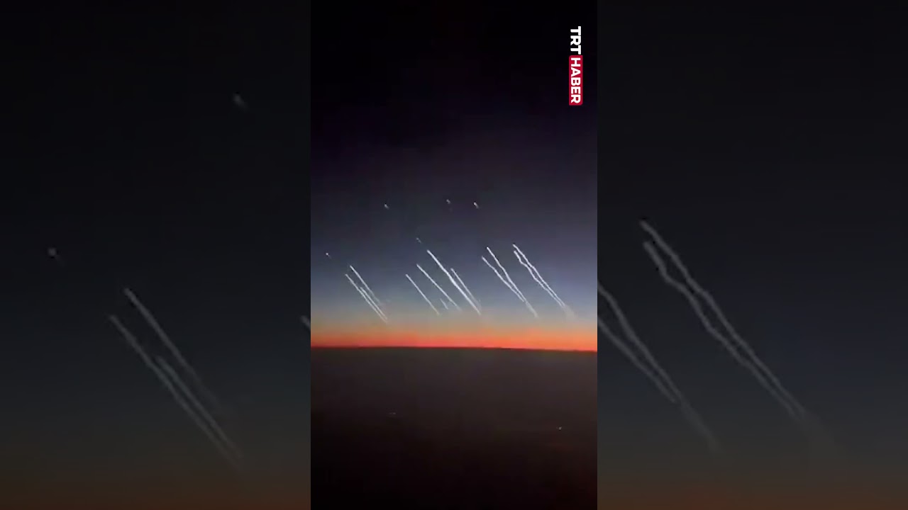 İran'ın İsrail'e attığı balistik füzeler Dubai semalarındaki yolcu uçağından görüntülendi
