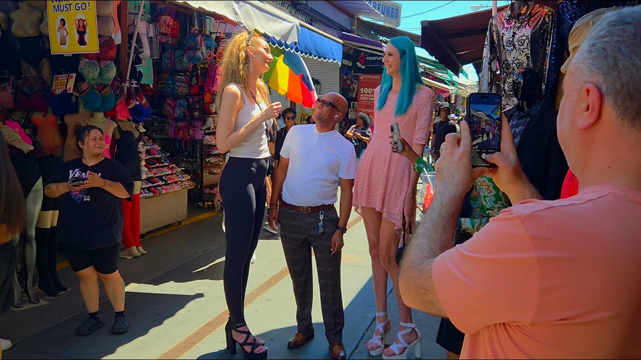 Reactions to 7-Foot Models in the Fashion District
