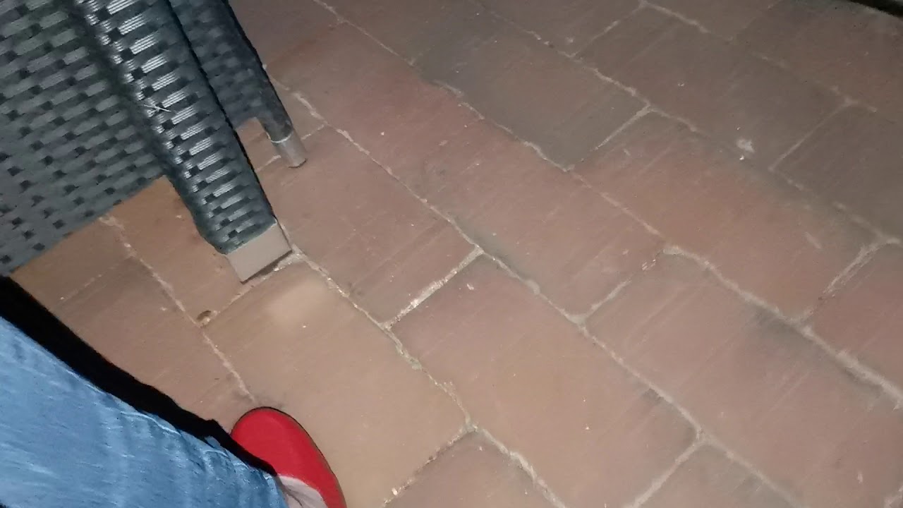 Red Tamaris Heels and skinny blue jeans