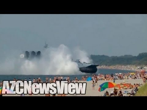 Russian Navy Hovercraft Lands On Busy Beach (PART ONE)