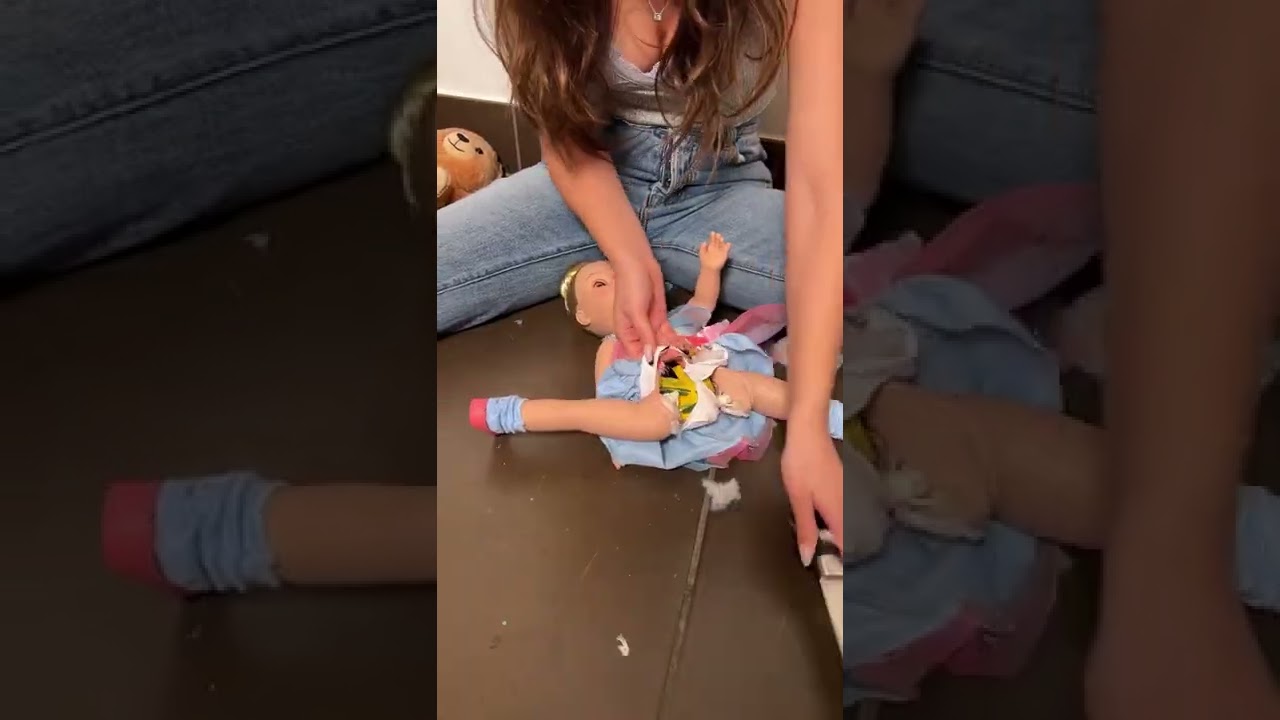 She found something in her daughter’s doll! 😳 #Shorts