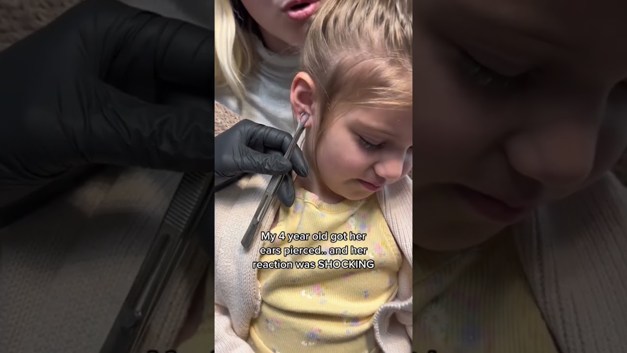 SHOCKING reaction to getting her ears pierced.. #shorts