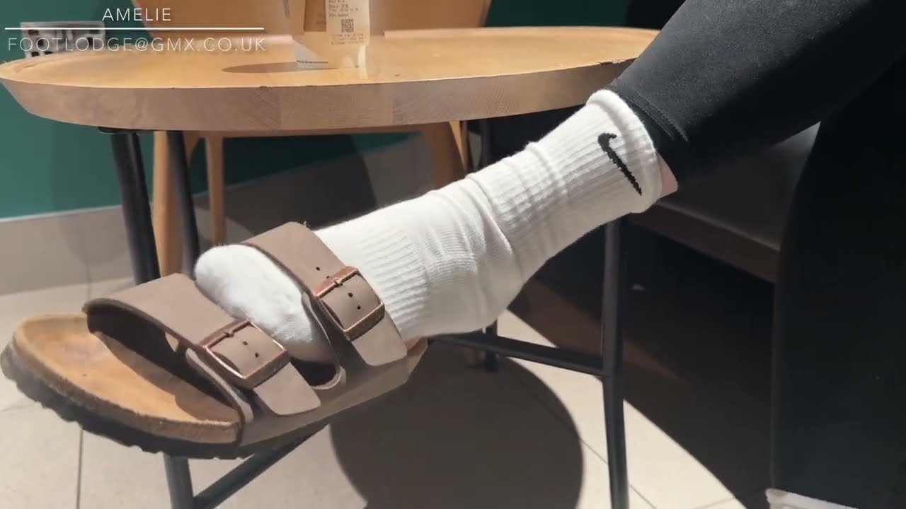 Shoeplay in Birkenstock sandals and Nike Socks